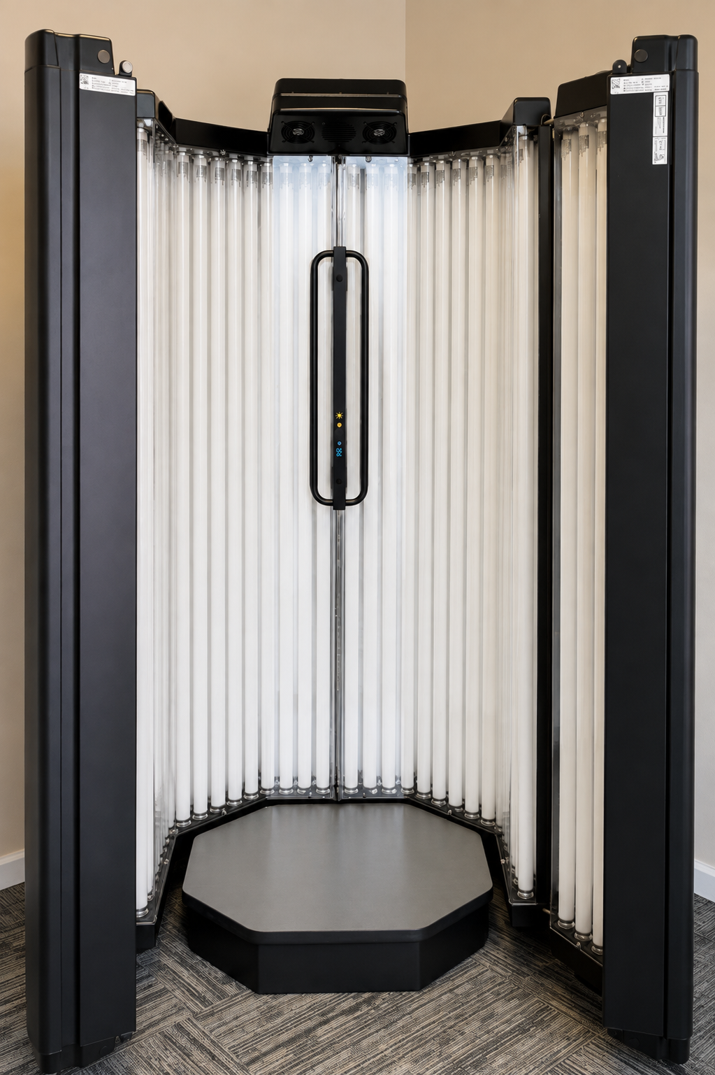 A full-body narrowband UVB phototherapy booth in a clinical treatment room